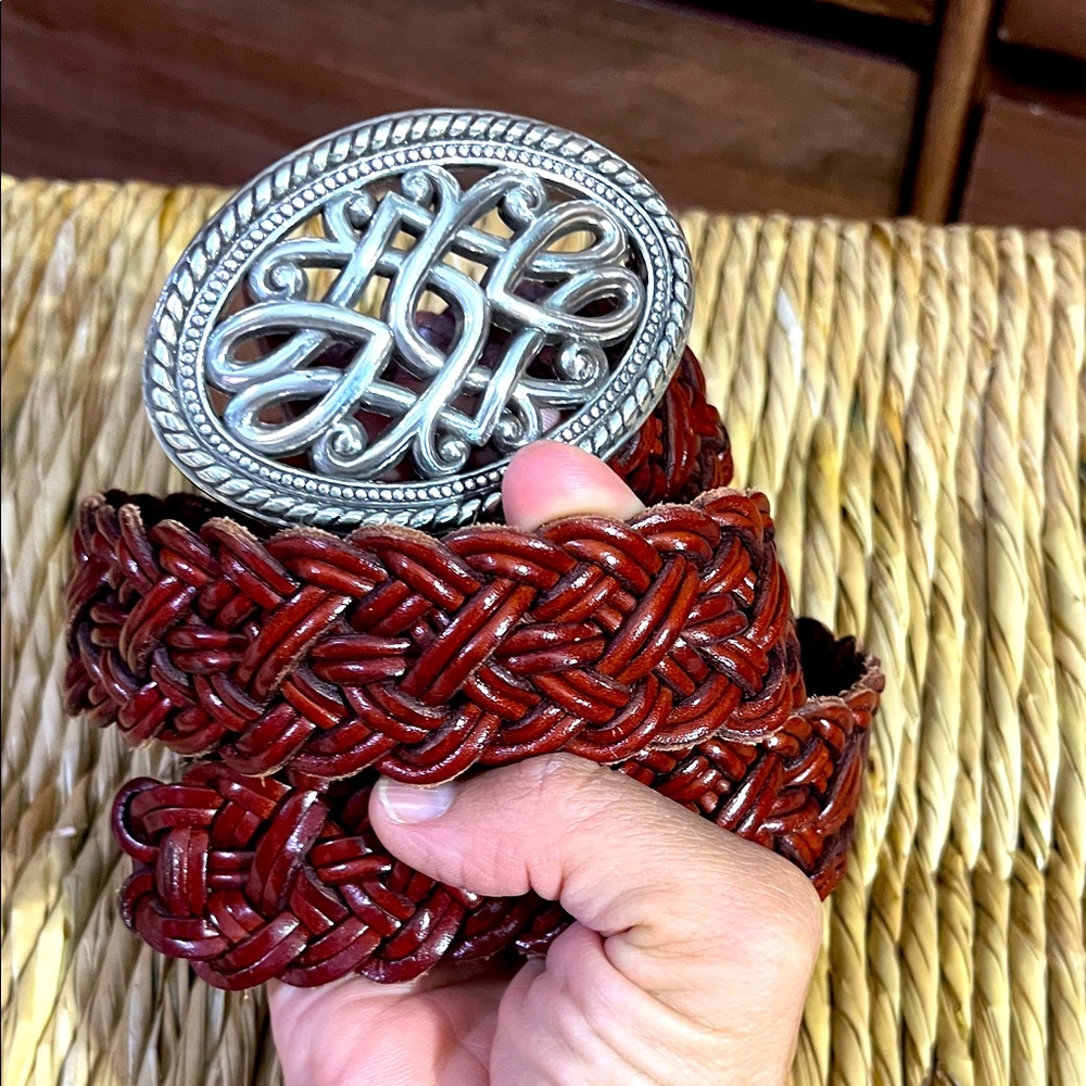 Leather braided women’s belt 39 large with silver buckle.